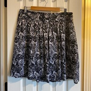 Peter Nygard black and white unique abstract floral print knee length skirt, 12P